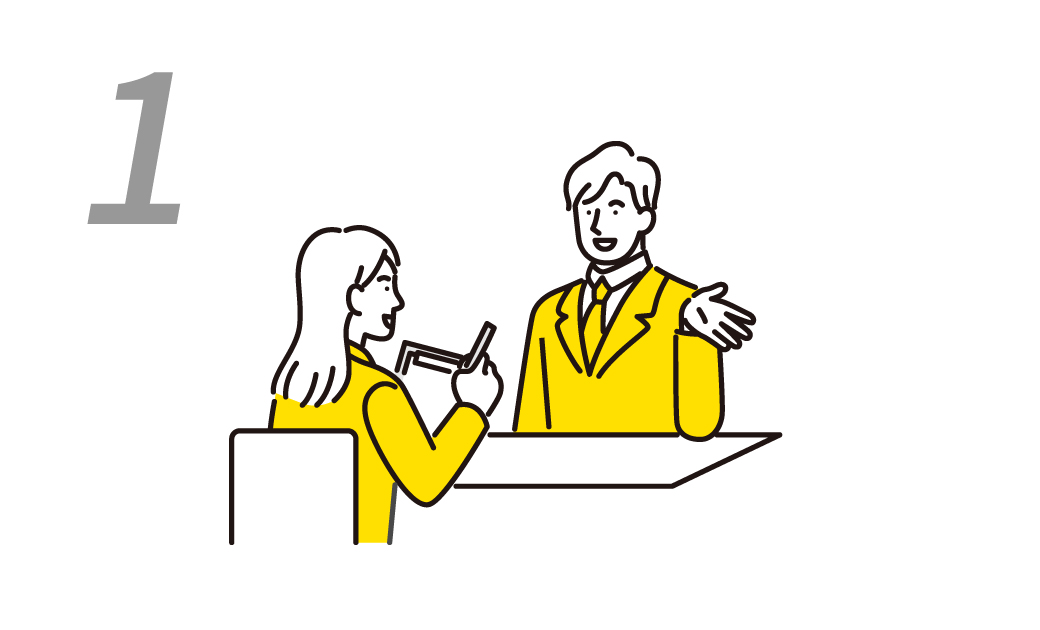 女性と男性が対面で打ち合わせしている